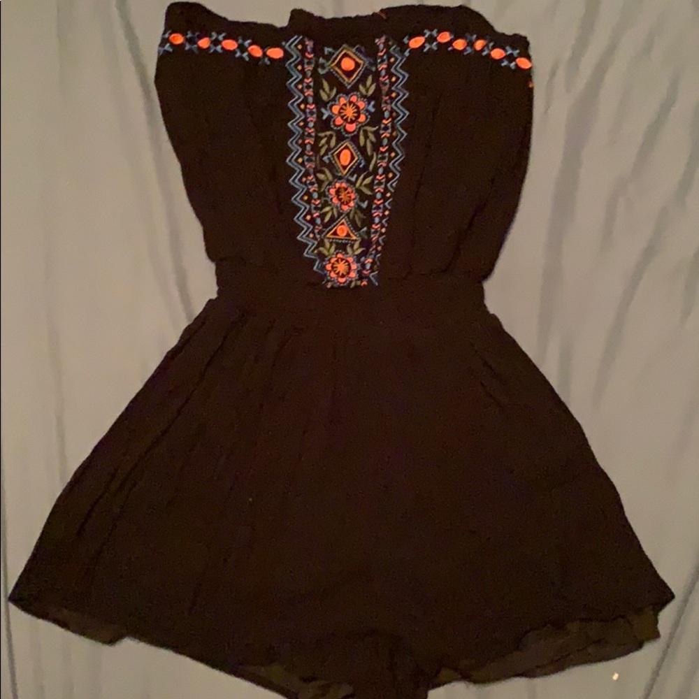 Black strapless romper with cute design on front